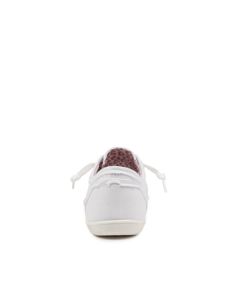 A single white canvas sneaker shown from the back, featuring a textured dark brown leather heel tab and white laces, set against a plain white background.