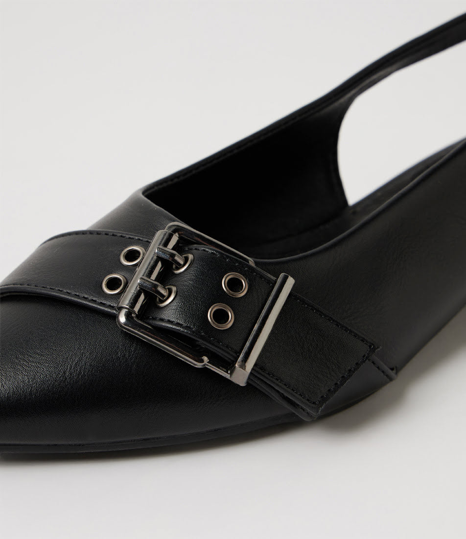 A close-up of a black leather slingback flat shoe featuring a decorative strap across the toe with metal eyelets and a silver-tone buckle.